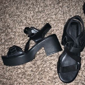 black strapped heels